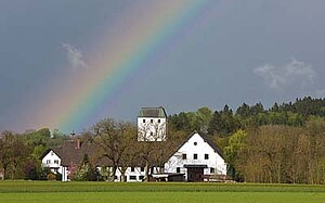 Bildinhalt: Reismühle mit Regenbogen